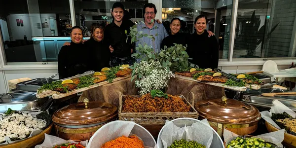 Soul Gourmet team around buffet spread